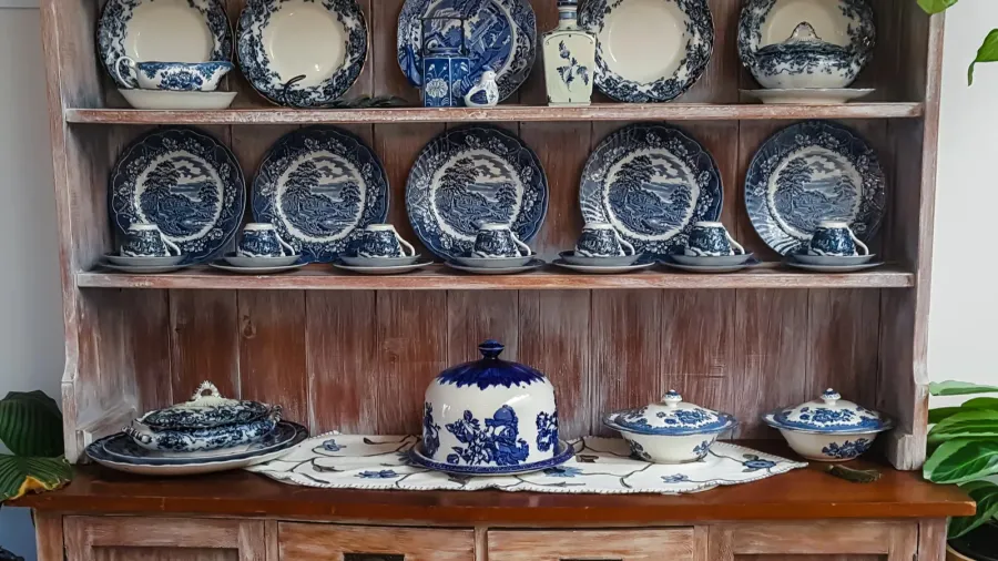 hutch dresser with blue china dinner set