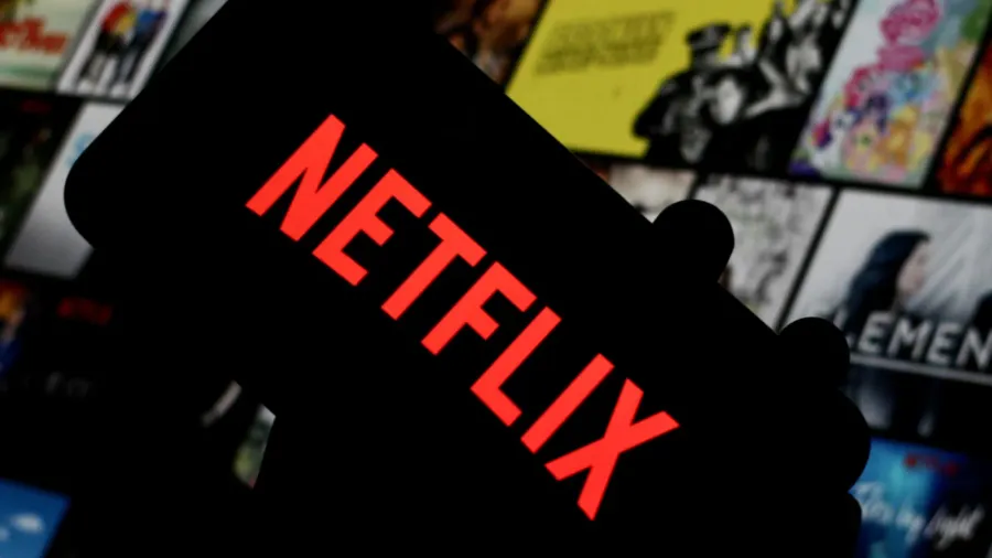 in this photo illustration the netflix logo is displayed on