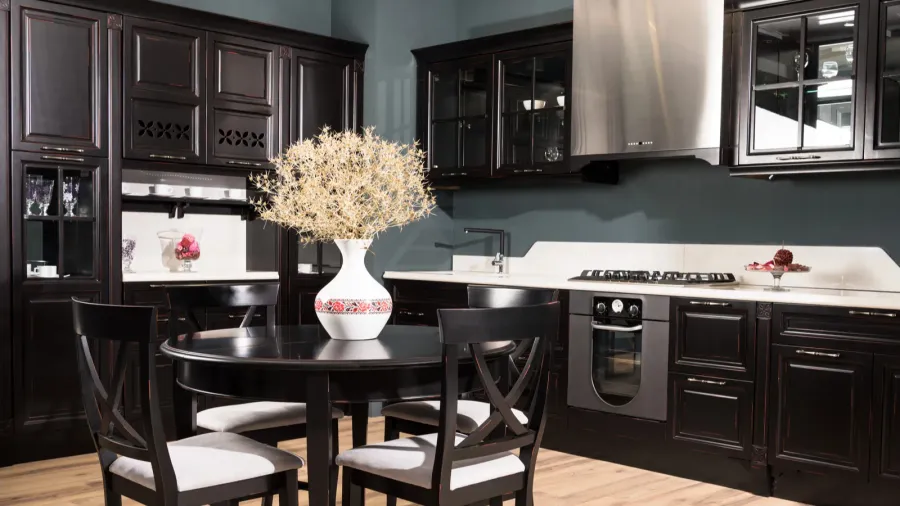 interior of modern kitchen and dining room with black wooden