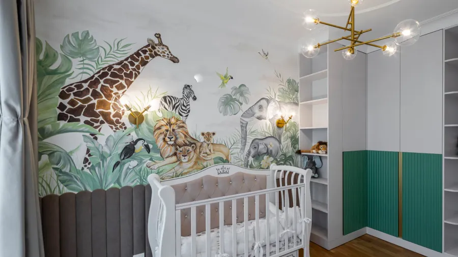 kids room with animals on the wall