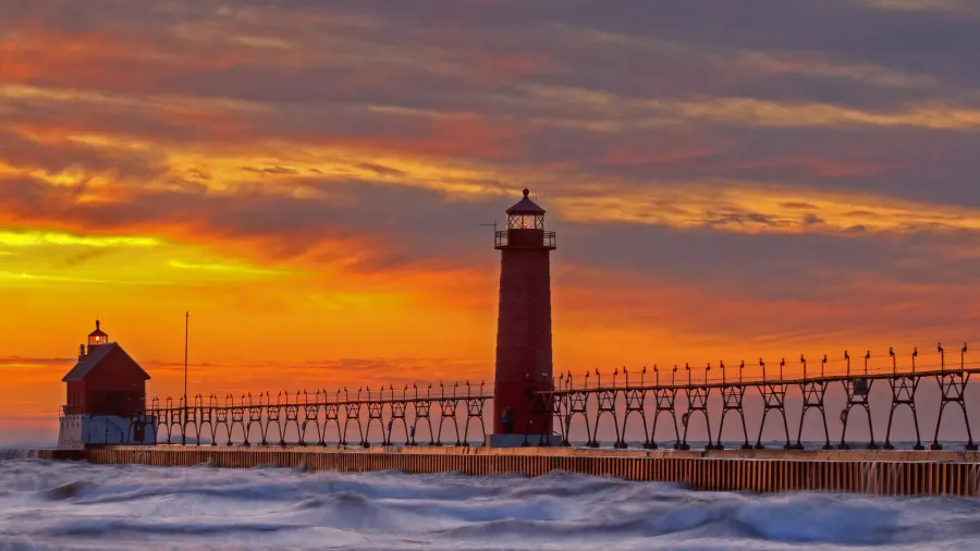 landscape of the grand haven michigan lighthouse pier and catwalk