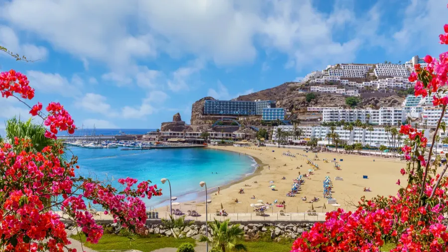 landscape with puerto rico village and beach on gran