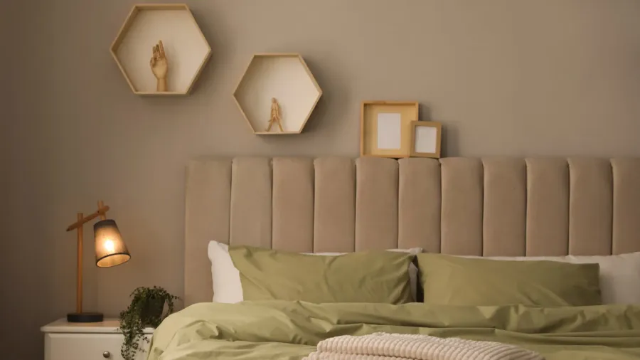 large comfortable bed with beautiful linens in room