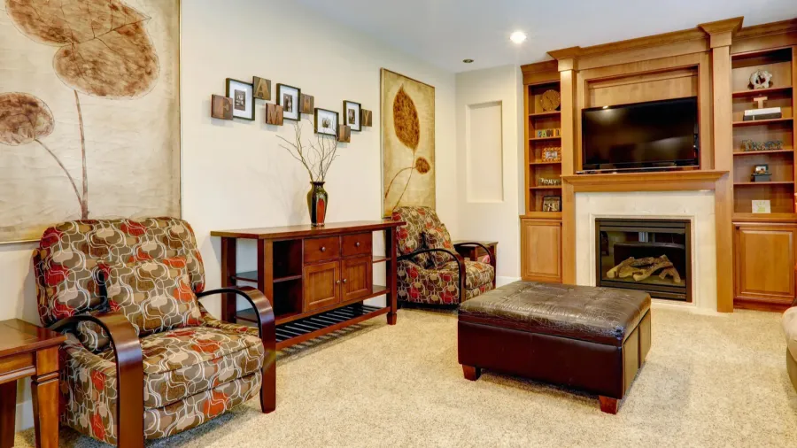 living room area with door to backyard