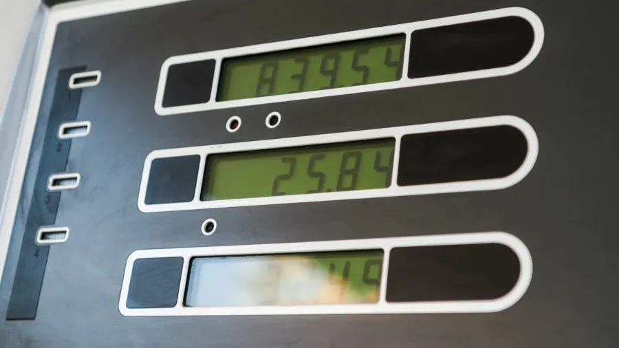 low angle view of price display on gasoline and benzine