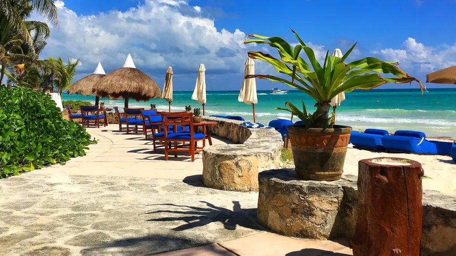 luxury blue beach chairs on the empty beachmexico