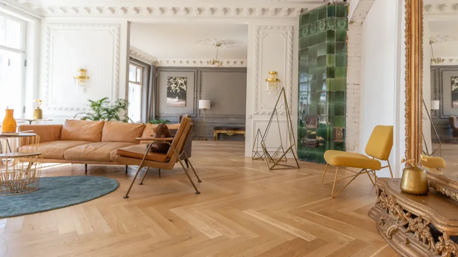 Luxury interior of a spacious apartment. Blend of modern and vintage furniture.