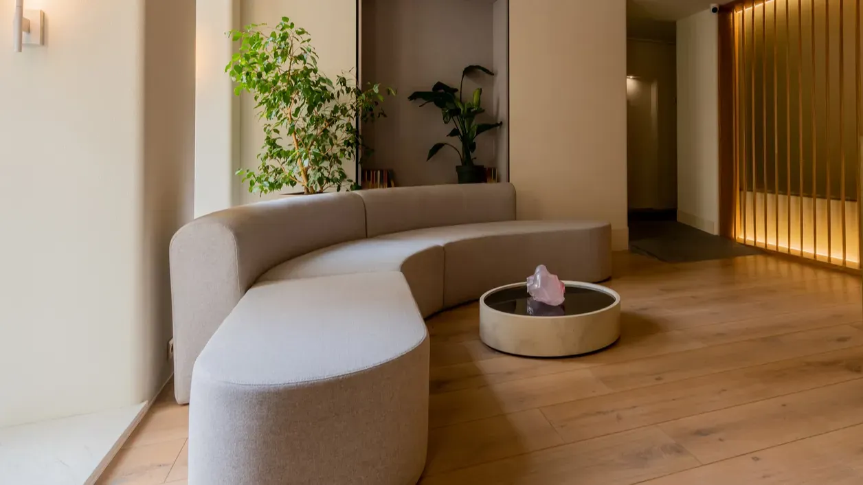 luxury reception desk near modern sofa and coffee table in