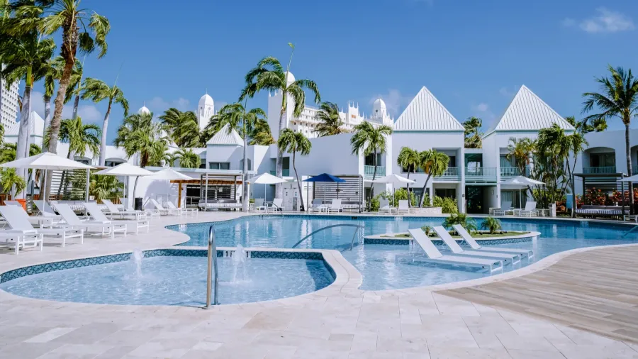 luxury resort with swimming pool near palm beach aruba