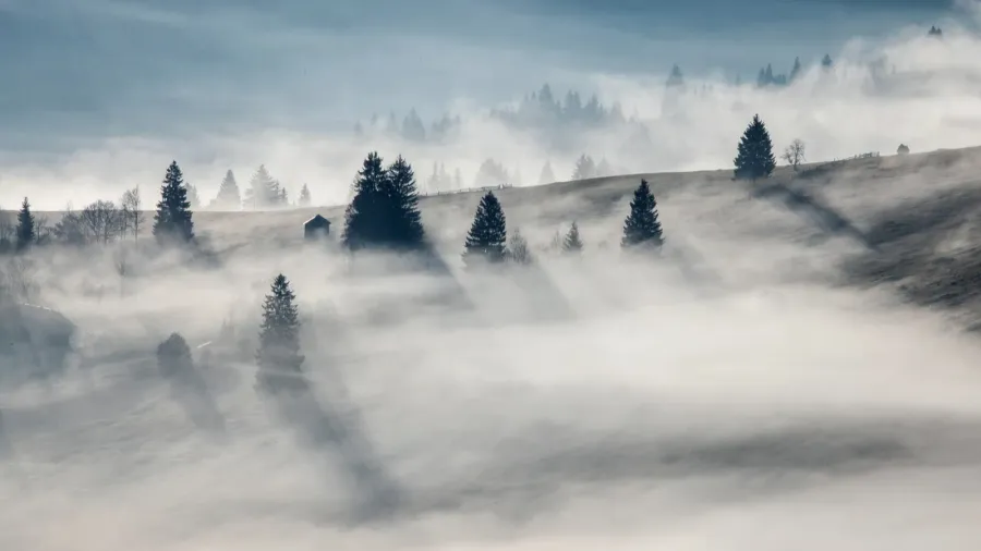 majestic sunrise in the mountains with fog clouds autumn nature