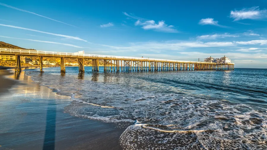 malibu pier on a clear day at sunset