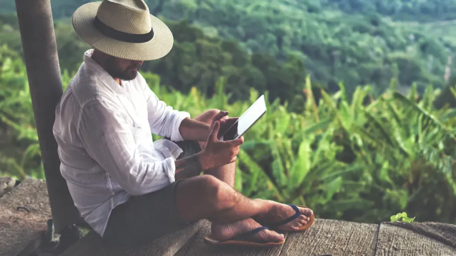 man traveler using digital tablet