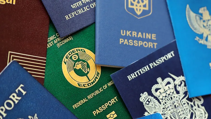 many various passports of citizens of different countries and regions