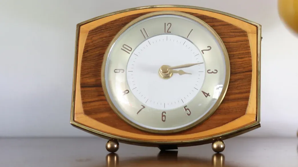 mid century decor vintage or retro clock in shape focus