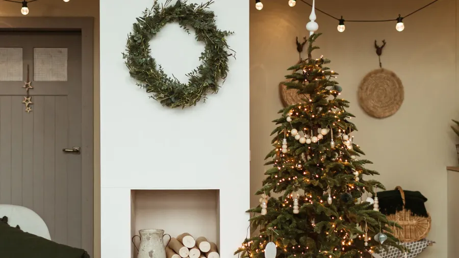 Modern interior design concept. Comfortable Scandinavian cozy living room decorated for Christmas.