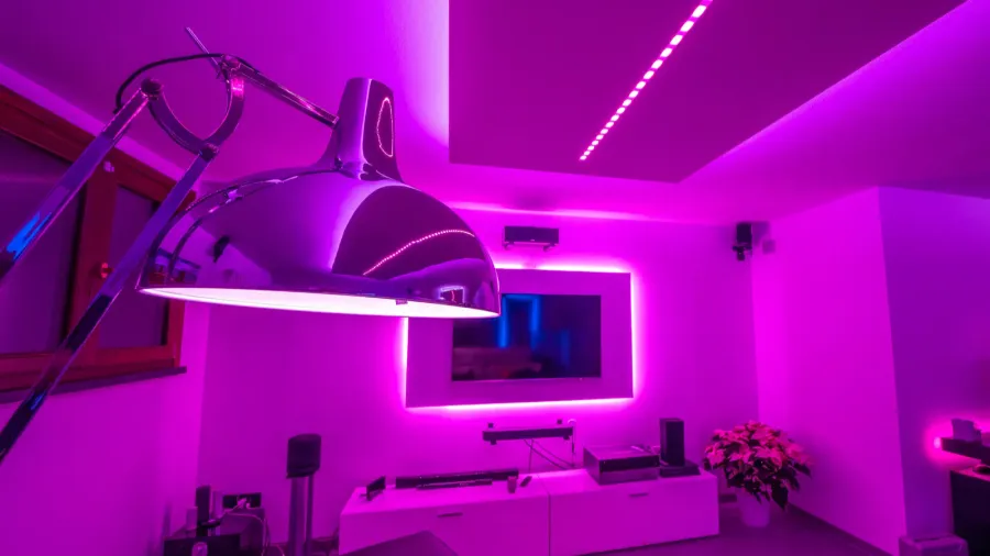 modern loungestyle basement with dynamic strip led lights and unique