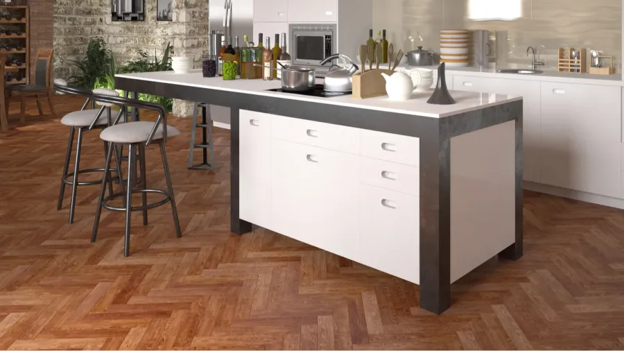 Modern kitchen with white cabinets, wooden floor, and an island with bar stools.