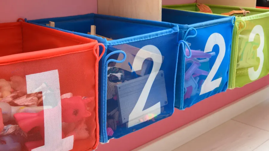 multicolored boxes with numbers filled with little things
