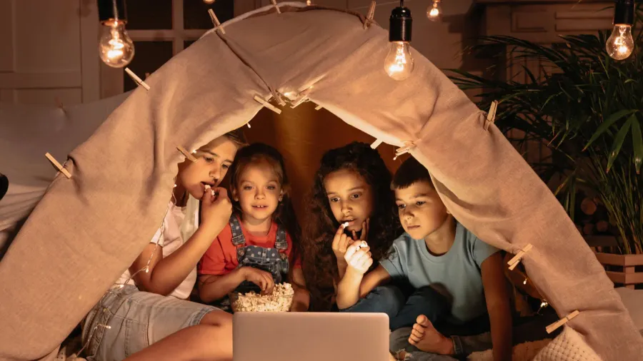 multicultural kids watching film