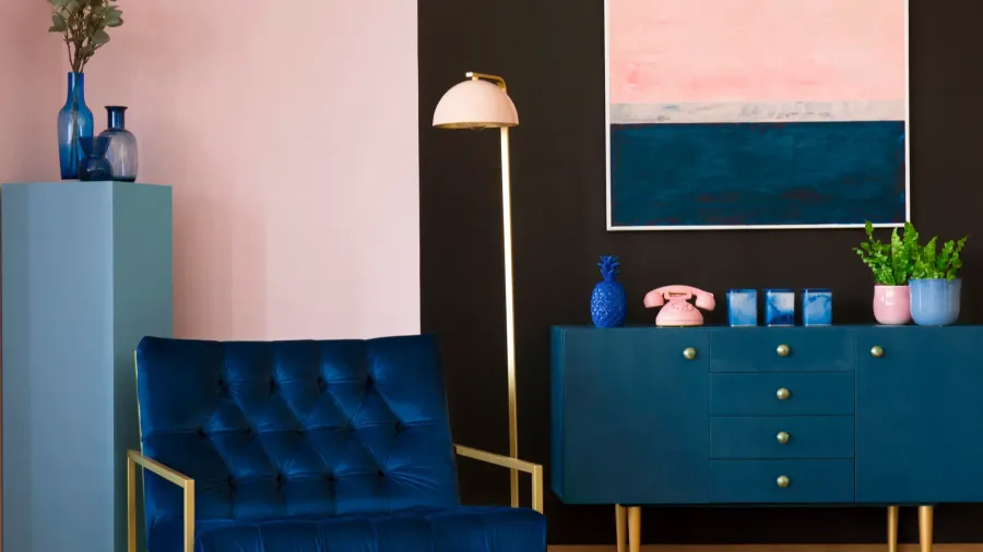 navy blue armchair in modern living room interior with pink