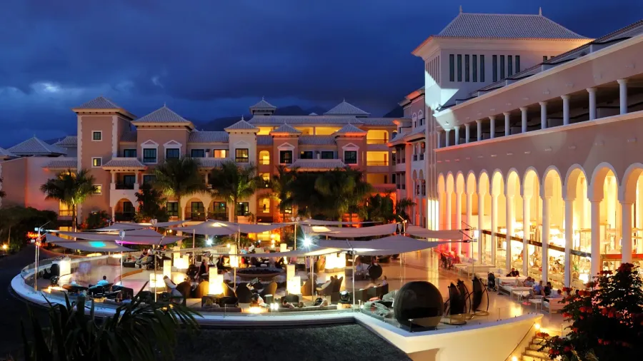 night illumination of luxury hotel and clouds tenerife island