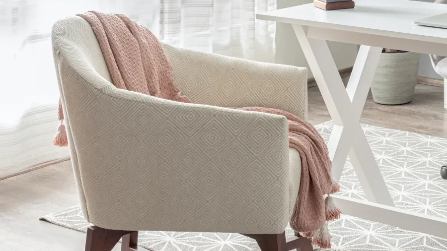 nordic living room featuring a modern white fabric lounge chair