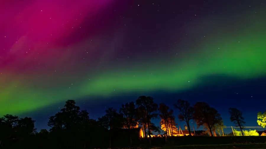 northern lights over lake burtnieks aurora borealis or northern lights