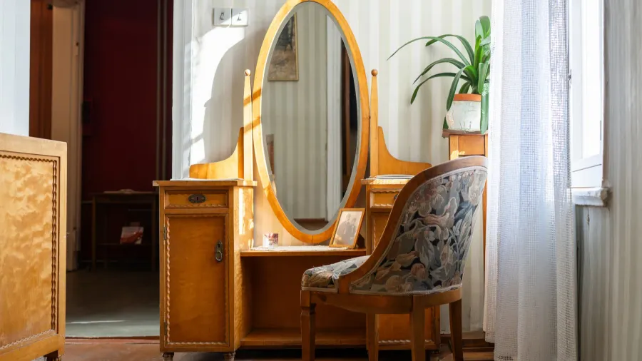 old style bedroom interior design with bed chair and vanity