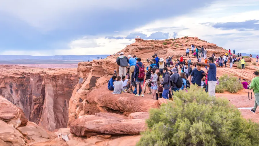 page arizona  may 25 hikers at horseshoe bend on