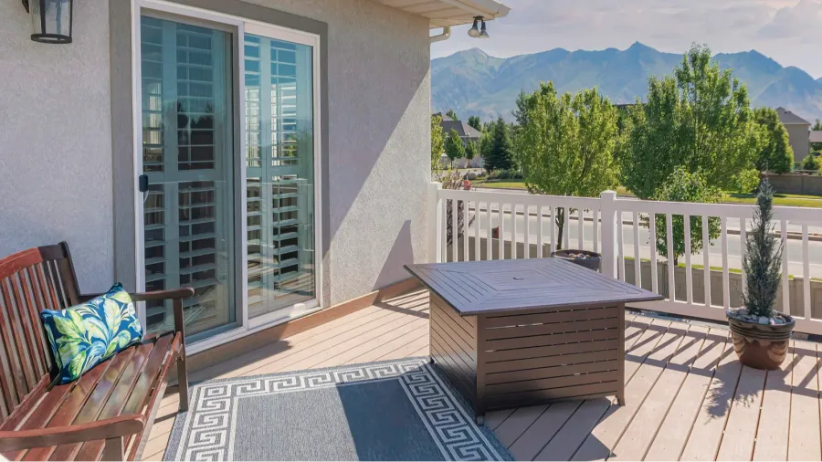 panorama puffy clouds at sunset deck of a house with