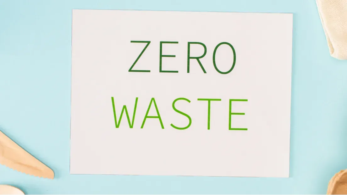 panoramic crop of card with zero waste lettering near disposable