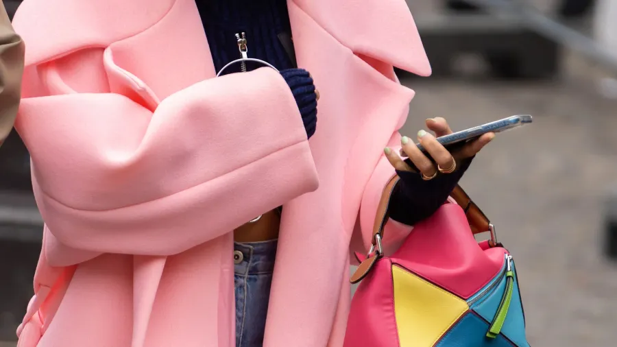 paris france  october 3 2022 woman wears loewe multicolor