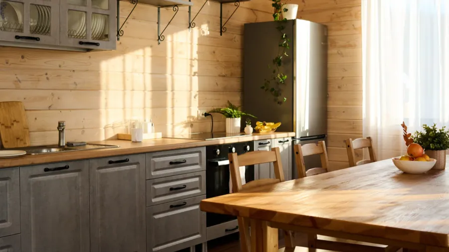 part of spacious kitchen with counter cabinets and drawers kitchenware