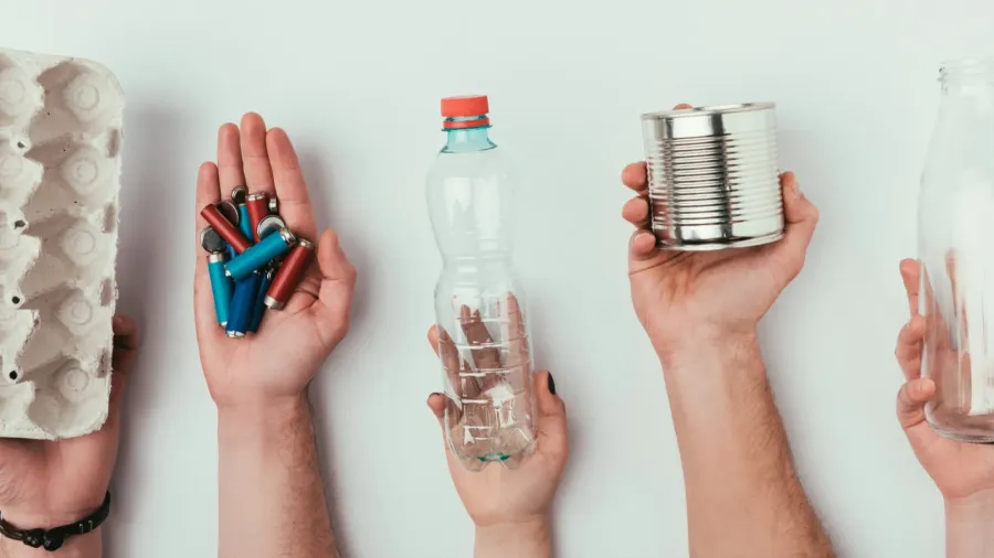 partial view of group of people holding various types of