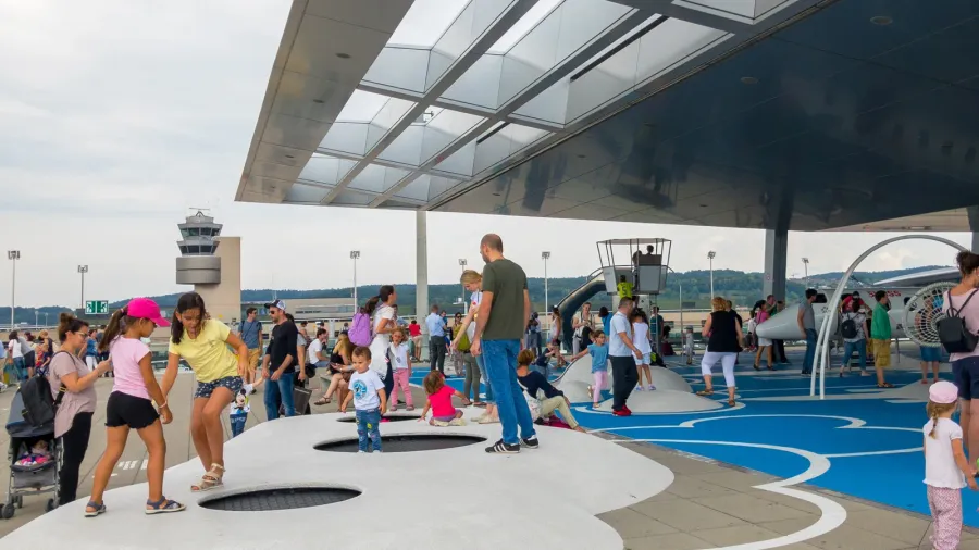passengers are visiting playground in the international airport