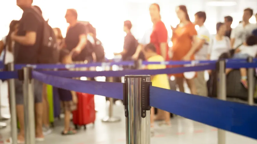 passengers checkin line at the airport