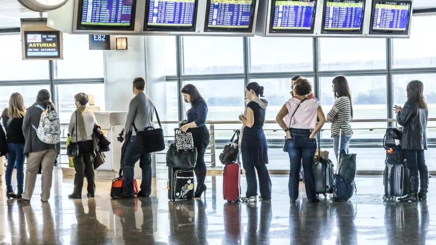 passengers wait for departure in madris airport due to delay