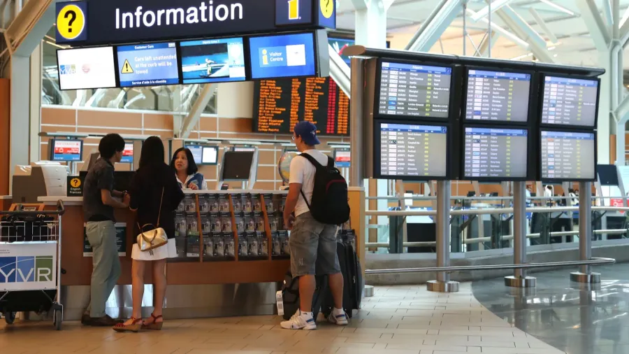 people asking some information insdie the yvr airport