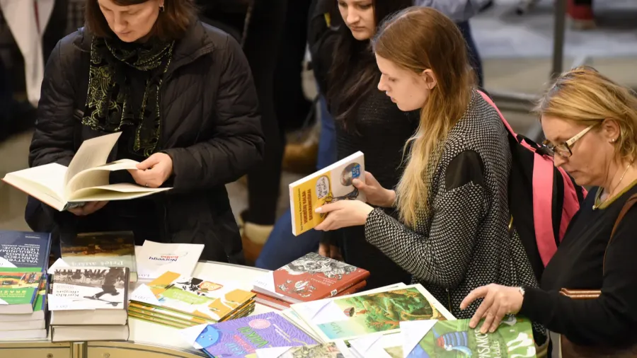 people choose books at the indoor book market