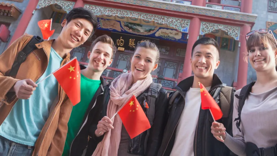 people holding chinese flags