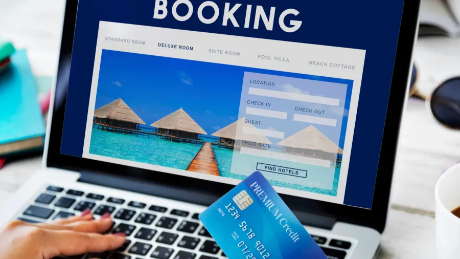 person using laptop in vacation