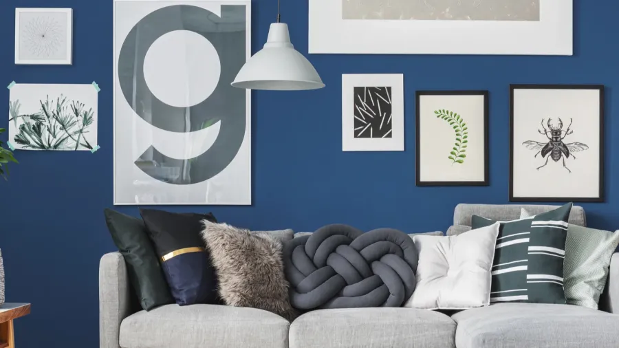 pillows on grey corner sofa