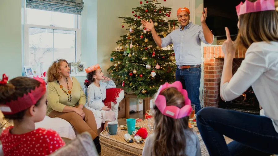Playing charades at Christmas.