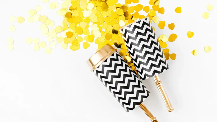 push confetti poppers on white background close up view