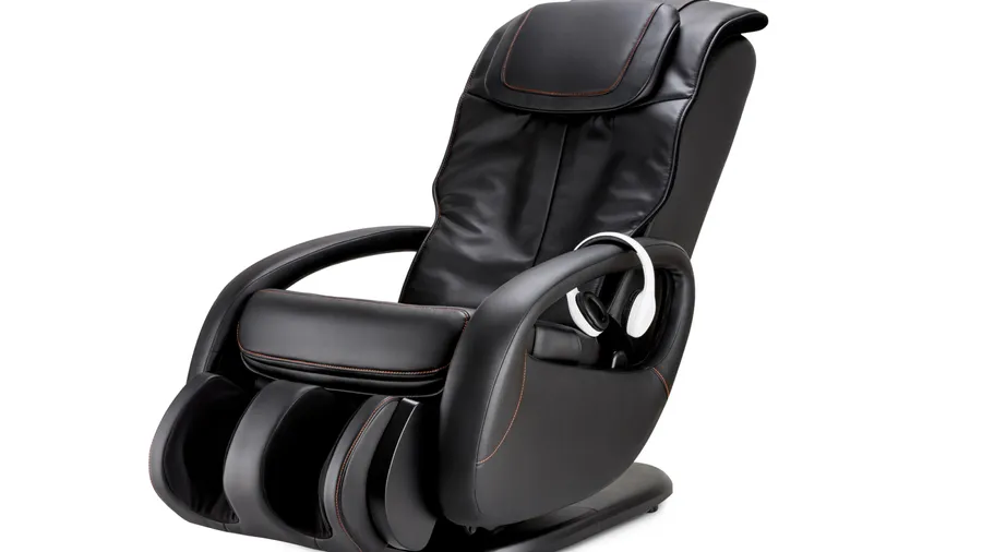Relaxing massage armchair on white background