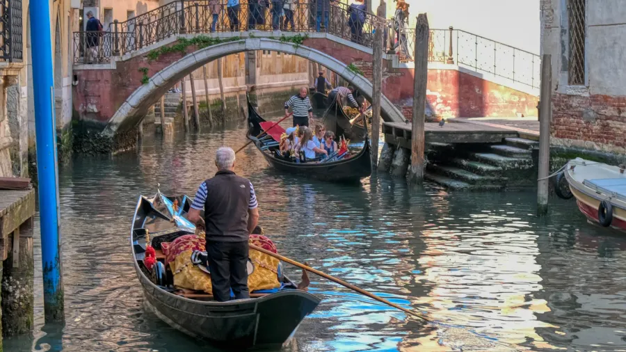 romantic gondola ride in the canals of venice italy