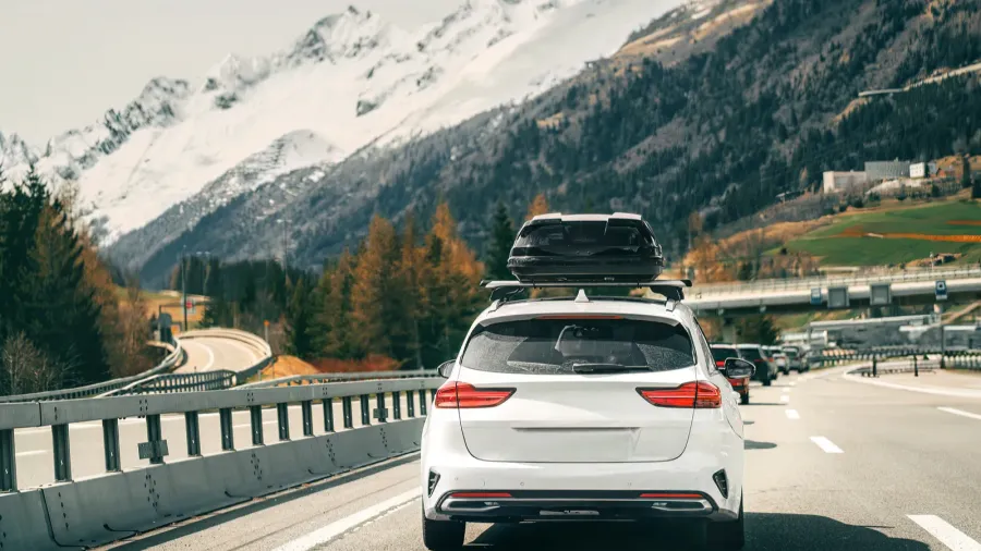 rooftop cargo carrier bag rear view of a car with
