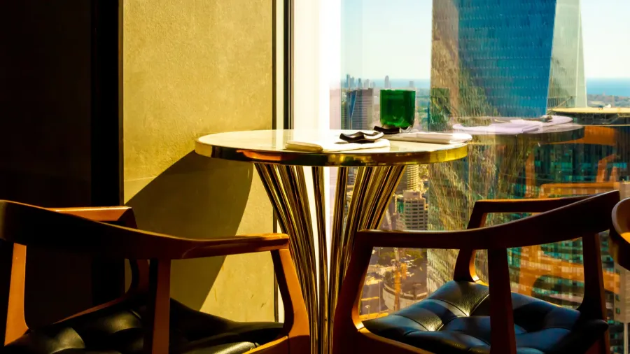 round table with armchairs in a restaurant or cafe with