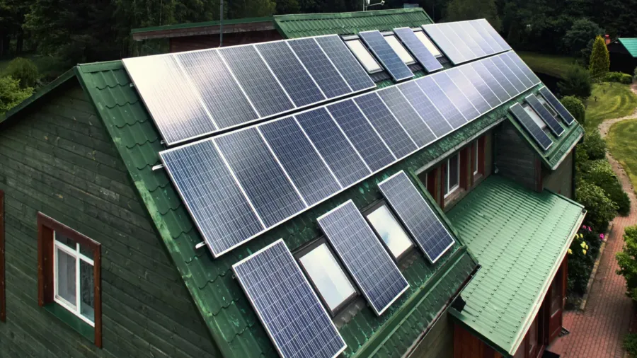 rustic wooden house with a solar panels
