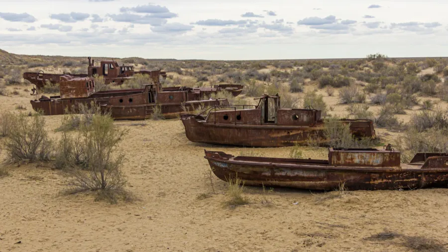 rusty ships at the ship cemetery in former aral sea